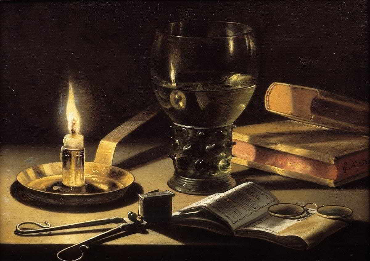 Dochtschere mit brennender Kerze